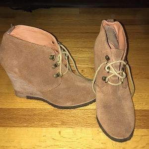 Beige suede booties.